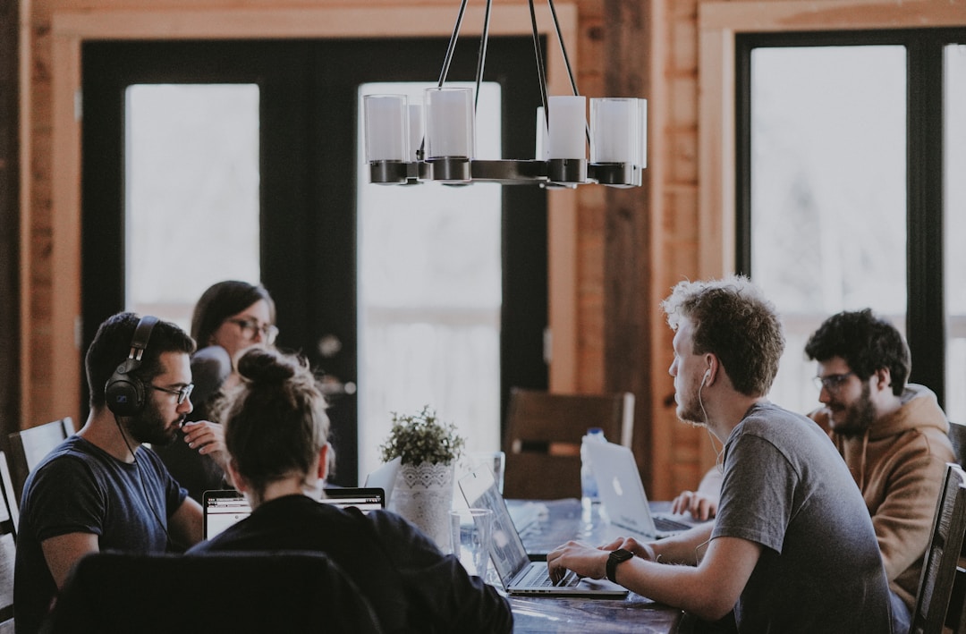 Employees in an office setting utilizing enterprise search to improve decision-making