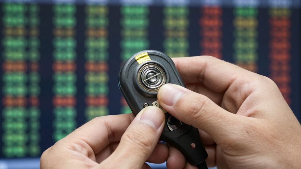 Trading options with financial district background.