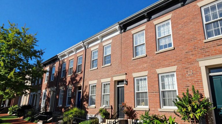 Baltimore row house with blue sky